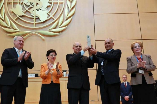 Dr. Roberto Morales, Minister of Public Health of Cuba, and Cuban physician Felix Báez Sarría, who contracted the Ebola virus while on a medical mission to combat the epidemic in Sierra 