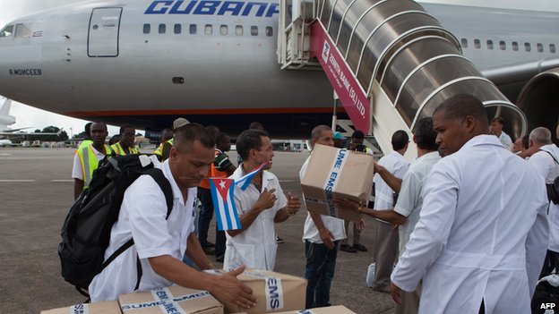 Cuban doctors arrive in West Africa during the 2014 Ebola outbreak   