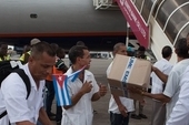Cuban doctors arrive in West Africa during the 2014 Ebola outbreak   