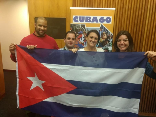 Yuniel Espinosa Reyes and Yelena Gomez Gomez, with CSC's Gordon Calliste and Yolanda Edo Figas