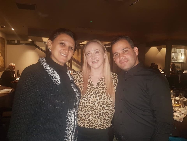 Yelena Gomez and Yuniel Espinosa with Tracy Delany, UNISON North West Region International Committee Secretary