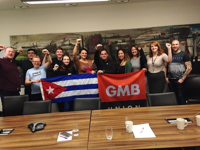 Yuniel and Yelena at GMB's National Office in London, with young members and officials