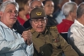 Cuba's former President Raul Castro (centre) and President Miguel Diaz-Canel (second left) attend an event celebrating Revolution Day in Santiago, Cuba