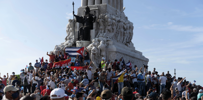 Pro-government supporters on 11 July. This image was used by multiple news agencies who captioned it as representing anti-government supporters