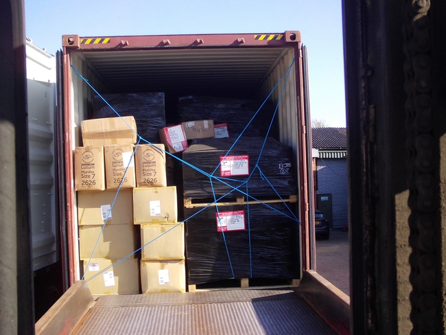 One container already filled to the brim and awaiting shipment