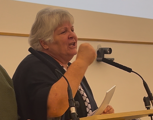 Aleida Guevara leads the audience in the International