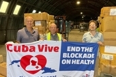 Rob Miller CSC director with staff at Jacob's Well packing the third consignment of medical aid for Cuba