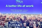 of UNISON delegates, including General Secretary Christina McAnea holding up Cuba Vive, End the Blockade on Health posters