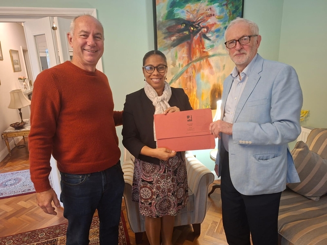 CSC Director Rob Miller and CSC Patron Jeremy Corbyn MP presenting  the donation to HE Ismara Vargas Walter CSC Director Rob Miller and CSC Patron Jeremy Corbyn MP presenting  the donation to HE Ismara Vargas Walter
