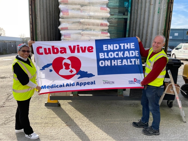 Cuban ambassador Ismara Vargas Walter and CSC director Rob Miller at the container depot in February